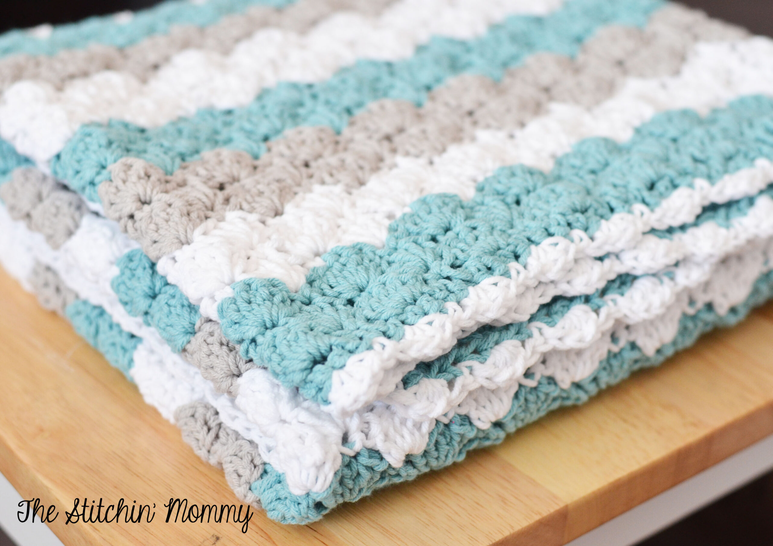 Finished Crochet Shell Stitch Baby Blanket — free crochet pattern