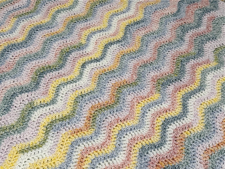 Finished Rainbow Striped Baby Blanket — free knitting pattern